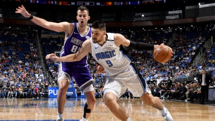 ORLANDO, FL - OCTOBER 30: Nikola Vucevic #9 of the Orlando Magic handles the ball against the Sacramento Kings on October 30, 2018 at Amway Center in Orlando, Florida. NOTE TO USER: User expressly acknowledges and agrees that, by downloading and/or using this Photograph, user is consenting to the terms and conditions of the Getty Images License Agreement. Mandatory Copyright Notice: Copyright 2018 NBAE (Photo by Fernando Medina/NBAE via Getty Images)