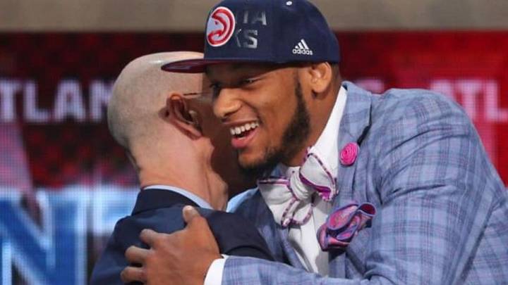 Jun 26, 2014; Brooklyn, NY, USA; Adreian Payne (Michigan State) gets a hug from NBA commissioner Adam Silver after being selected as the number fifteen overall pick to the Atlanta Hawks in the 2014 NBA Draft at the Barclays Center. Mandatory Credit: Brad Penner-USA TODAY Sports Jun 26, 2014; Brooklyn, NY, USA; Adreian Payne (Michigan State) gets a hug from NBA commissioner Adam Silver after being selected as the number fifteen overall pick to the Atlanta Hawks in the 2014 NBA Draft at the Barclays Center. Mandatory Credit: Brad Penner-USA TODAY Sports