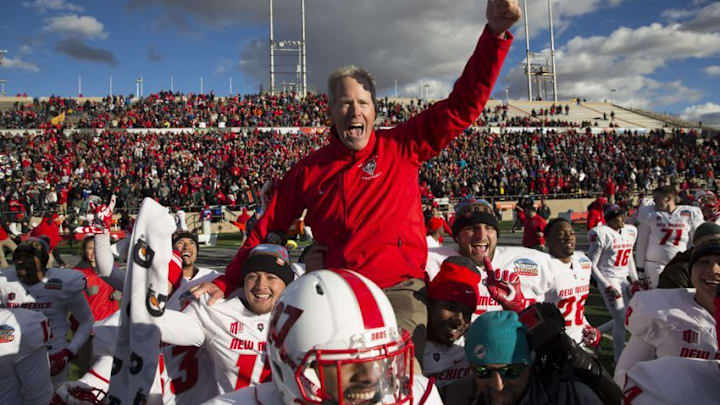 Dec 17, 2016; Albuquerque, NM, USA; New Mexico Lobos head coach Bob Davie is carried off by his players after defeating the UTSA Roadrunners in the New Mexico Bowl at University Stadium. Mandatory Credit: Ivan Pierre Aguirre-USA TODAY Sports