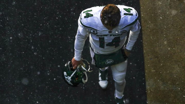 FOXBOROUGH, MA - JANUARY 03: Sam Darnold #14 of the New York Jets walks off the field after a loss to the New England Patriots at Gillette Stadium on January 3, 2021 in Foxborough, Massachusetts. (Photo by Adam Glanzman/Getty Images)