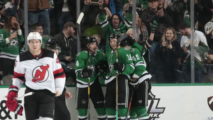 DALLAS, TX - JANUARY 2: Miro Heiskanen #4, Tyler Pitlick #18, Roman Polak #45 and the Dallas Stars celebrate a goal against the New Jersey Devils at the American Airlines Center on January 2, 2019 in Dallas, Texas. (Photo by Glenn James/NHLI via Getty Images)