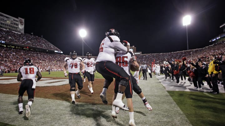 Offensive lineman Deveric Gallington #66 of Texas Tech celebrates with wide receiver Alex Torres #86 (Photo by Brett Deering/Getty Images)
