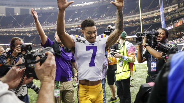 NEW ORLEANS, LA – JANUARY 13: Safety Grant Delpit #7 of the LSU Tigers raises his hands to the fans while he is leaving the field after the College Football Playoff National Championship game against the Clemson Tigers at the Mercedes-Benz Superdome on January 13, 2020 in New Orleans, Louisiana. LSU defeated Clemson 42 to 25. (Photo by Don Juan Moore/Getty Images)