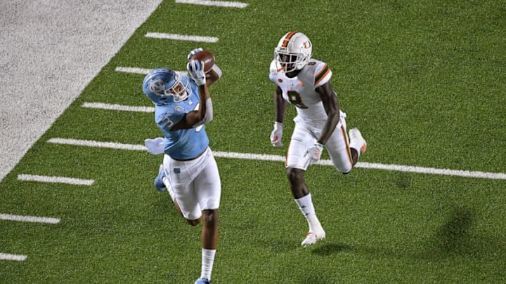 CHAPEL HILL, NORTH CAROLINA - SEPTEMBER 07: Antoine Green #3 of the North Carolina Tar Heels makes a catch against DJ Ivey #8 of the Miami Hurricanes during the first half of their game at Kenan Stadium on September 07, 2019 in Chapel Hill, North Carolina. (Photo by Grant Halverson/Getty Images)