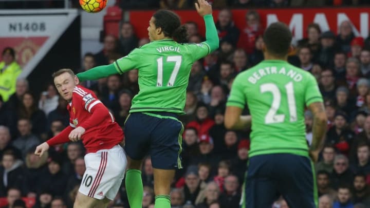 MANCHESTER, ENGLAND – JANUARY 23: Wayne Rooney of Manchester United in action with Virgil van Dijk of Southampton during the Barclays Premier League match between Manchester United and Jose Fonte at Old Trafford on January 23, 2016 in Manchester, England. (Photo by John Peters/Man Utd via Getty Images)