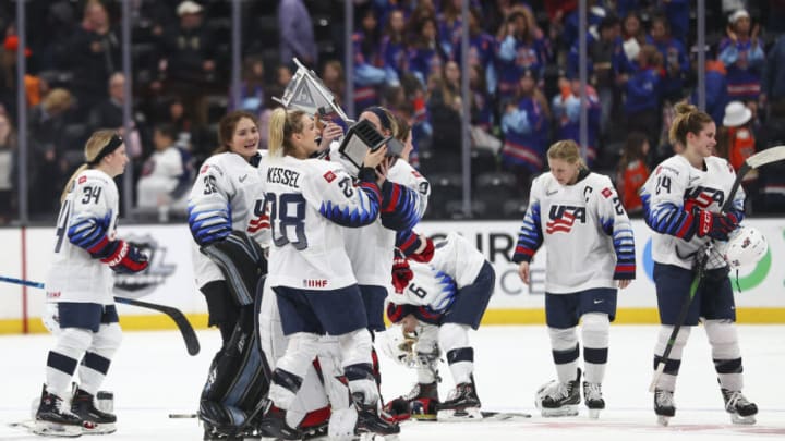 ANAHEIM, CALIFORNIA - FEBRUARY 08: The U.S. Women's Hockey Team holds up the Rivalry Series trophy after defeating Canada at Honda Center on February 08, 2020 in Anaheim, California. (Photo by Meg Oliphant/Getty Images)