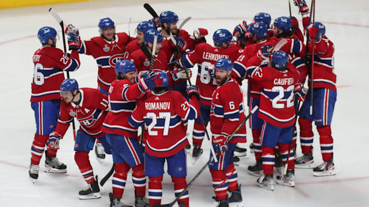Jul 5, 2021; Montreal, Quebec, CAN; Montreal Canadiens right wing Josh Anderson (17) is congratulated by teammates after scoring the game winning goal against Tampa Bay Lightning goaltender Andrei Vasilevskiy (not pictured) during overtime in game four of the 2021 Stanley Cup Final at Bell Centre. Mandatory Credit: Jean-Yves Ahern-USA TODAY Sports