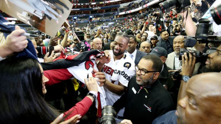 WASHINGTON, DC -  MARCH 23: Dwyane Wade #3 of the Miami Heat signs autographs after the game against the Washington Wizards on March 23, 2019 at Capital One Arena in Washington, DC. NOTE TO USER: User expressly acknowledges and agrees that, by downloading and or using this Photograph, user is consenting to the terms and conditions of the Getty Images License Agreement. Mandatory Copyright Notice: Copyright 2019 NBAE (Photo by Nathaniel S. Butler/NBAE via Getty Images)