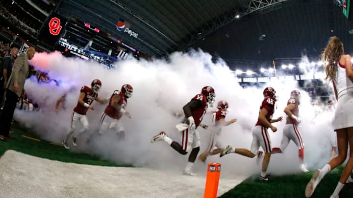 ARLINGTON, TX - DECEMBER 2: The Oklahoma Sooners take the field before playing the TCU Horned Frogs during the first half at AT&T Stadium on December 2, 2017 in Arlington, Texas. OU won 41-17. (Photo by Ron Jenkins/Getty Images)