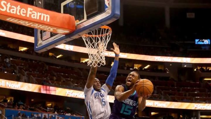 ORLANDO, FL – JANUARY 22: Kemba Walker #15 of the Charlotte Hornets attempts a shot against Victor Oladipo #5 of the Orlando Magic during the game at Amway Center on January 22, 2016 in Orlando, Florida. NOTE TO USER: User expressly acknowledges and agrees that, by downloading and/or using this Photograph, user is consenting to the terms and conditions of the Getty Images License Agreement. (Photo by Sam Greenwood/Getty Images)