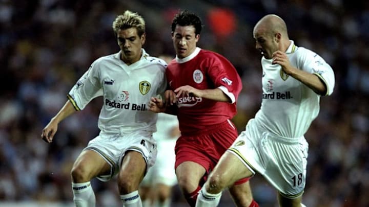 23 Aug 1999: Robbie Fowler of Liverpool takes on Jonathan Woodgate and Danny Mills of Leeds United during the FA Carling Premiership match against Leeds United played at Elland Road in Leeds, England. The match finished in a 2-1 win to the visitors Liverpool. Mandatory Credit: Clive Brunskill /Allsport