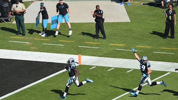 Oct 30, 2016; Charlotte, NC, USA; Carolina Panthers outside linebacker Thomas Davis (58) scores a touchdown as middle linebacker Luke Kuechly (59) celebrates in the first quarter at Bank of America Stadium. Mandatory Credit: Bob Donnan-USA TODAY Sports