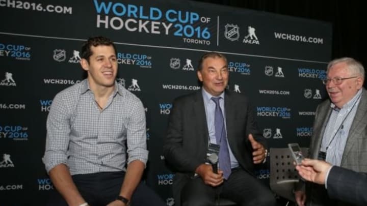 Sep 9, 2015; Toronto, Ontario, Canada; Vladislav Tretiak answers questions from the press as Evgeni Malkin (left) and an interpreter (right) look on during a press conference and media event for the 2016 World Cup of Hockey at Air Canada Centre. Mandatory Credit: Tom Szczerbowski-USA TODAY Sports