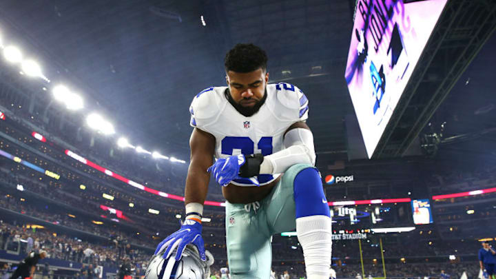 ARLINGTON, TX - DECEMBER 26: Ezekiel Elliott #21 of the Dallas Cowboys takes a knee in the end zone before the Cowboys played the Detroit Lions at AT&T Stadium on December 26, 2016 in Arlington, Texas. (Photo by Tom Pennington/Getty Images)