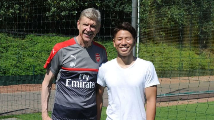 ST ALBANS, ENGLAND - JULY 19: New signing Takuma Asano with Arsenal manager Arsene Wenger at London Colney on July 19, 2016 in St Albans, England. (Photo by Stuart MacFarlane/Arsenal FC via Getty Images)
