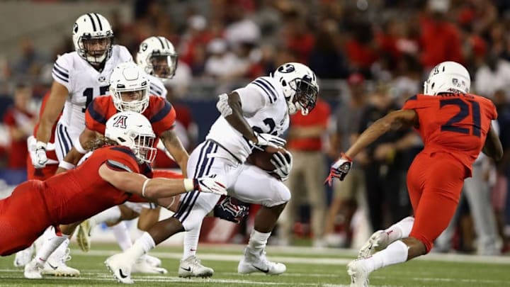 TUCSON, AZ - SEPTEMBER 01: Running back Squally Canada #22 of the Brigham Young Cougars rushes the football against the Arizona Wildcats during the college football game at Arizona Stadium on September 1, 2018 in Tucson, Arizona. The Cougars defeated the Wildcats 28-23. (Photo by Christian Petersen/Getty Images)