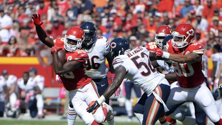 Oct 11, 2015; Kansas City, MO, USA; Kansas City Chiefs running back Jamaal Charles (25) is tackled by Chicago Bears outside linebacker LaRoy Reynolds (52) in the second half at Arrowhead Stadium. Chicago won the game 18-17. Mandatory Credit: John Rieger-USA TODAY Sports