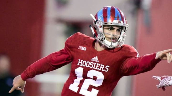 Oct 29, 2016; Bloomington, IN, USA; Indiana Hoosiers quarterback Zander Diamont (12) celebrates after scoring a touchdown in the second half of the game at Memorial Stadium. The Hoosiers won 42 to 36. Mandatory Credit: Marc Lebryk-USA TODAY Sports