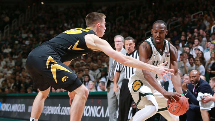 EAST LANSING, MI – DECEMBER 03: Joshua Langford #1 of the Michigan State Spartans handles the ball while defended by Joe Wieskamp #10 of the Iowa Hawkeyes in the first half at Breslin Center on December 3, 2018 in East Lansing, Michigan. (Photo by Rey Del Rio/Getty Images)