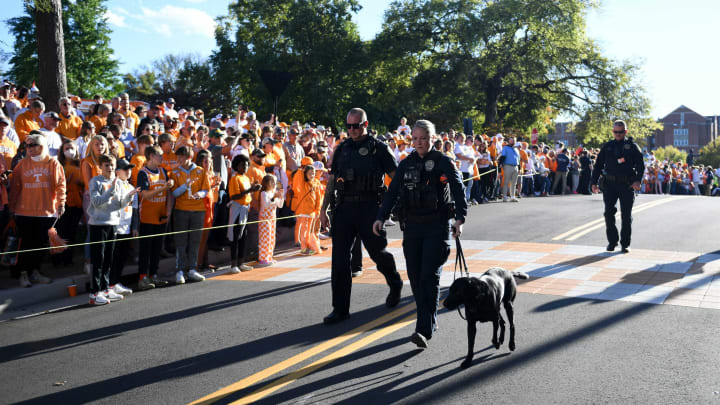 Police security with a final walk through before the start of the Vol Walk at the NCAA college football game between Tennessee and Ole Miss in Knoxville, Tenn. on Saturday, October 16, 2021.Utvom1016