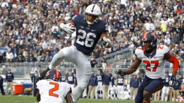 STATE COLLEGE, PA – OCTOBER 31: Saquon Barkley #26 of the Penn State Nittany Lions jumps over defenders V’Angelo Bentley #2, Taylor Barton #3 and Eaton Spence #27 of the Illinois Fighting Illini for a 7 yard touchdown run in the fourth quarter during the game on October 31, 2015 at Beaver Stadium in State College, Pennsylvania. (Photo by Justin K. Aller/Getty Images)