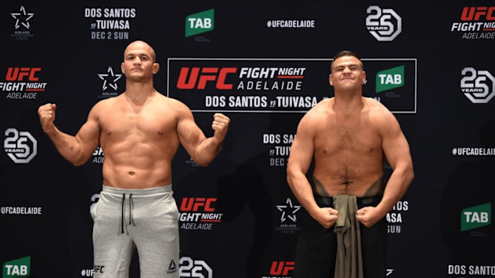 ADELAIDE, AUSTRALIA - NOVEMBER 30: (L-R) Opponents Junior Dos Santos of Brazil and Tai Tuivasa of Australia pose for media and fans during the UFC Fight Night weigh-in event at Hilton Adelaide on November 30, 2018 in Adelaide, Australia. (Photo by Jeff Bottari/Zuffa LLC/Zuffa LLC via Getty Images)