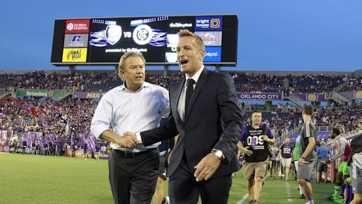 Oct 16, 2015; Orlando, FL, USA; Orlando City SC head coach Adrian Heath and New York City FC head coach Jason Kreis talk before the game at Orlando Citrus Bowl Stadium. Mandatory Credit: Kim Klement-USA TODAY Sports