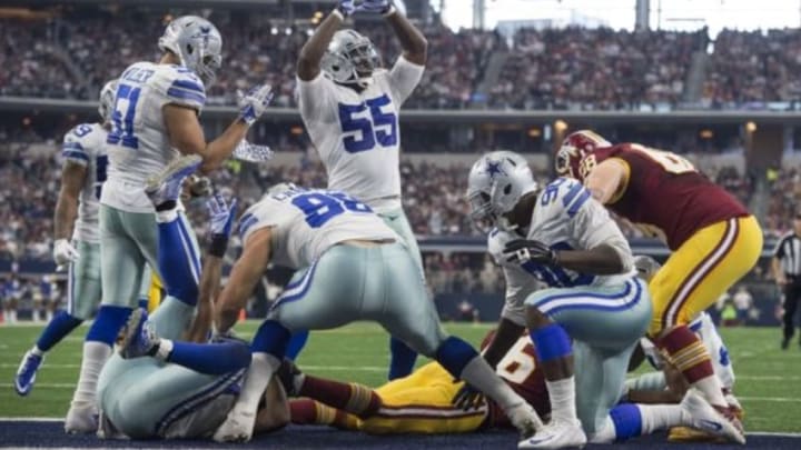 Jan 3, 2016; Arlington, TX, USA; Dallas Cowboys middle linebacker Rolando McClain (55) celebrates the defense making a safety during the second half against the Washington Redskins at AT&T Stadium. The Redskins defeat the Cowboys 34-23. Mandatory Credit: Jerome Miron-USA TODAY Sports