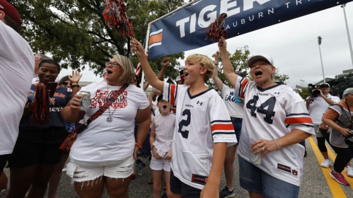 Auburn footballSep 2, 2023; Auburn, Alabama, USA; Auburn Tigers fans cheer during Tiger Walk before the game against the against the Massachusetts Minutemen at Jordan-Hare Stadium. Mandatory Credit: John Reed-USA TODAY Sports