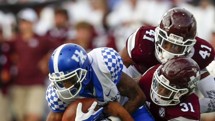 STARKVILLE, MS – OCTOBER 21: Garrett Johnson #9 of the Kentucky Wildcats catches a pass as Maurice Smitherman #31 of the Mississippi State Bulldogs tackles him during the first half of a NCAA football game at Davis Wade Stadium on October 21, 2017 in Starkville, Mississippi. (Photo by Butch Dill/Getty Images)