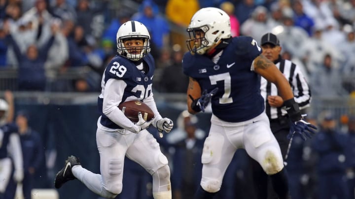 STATE COLLEGE, PA – OCTOBER 27: John Reid #29 of the Penn State Nittany Lions returns an interception 44 yards to the 3 yard line in the first half against the Iowa Hawkeyes on October 27, 2018 at Beaver Stadium in State College, Pennsylvania. (Photo by Justin K. Aller/Getty Images)