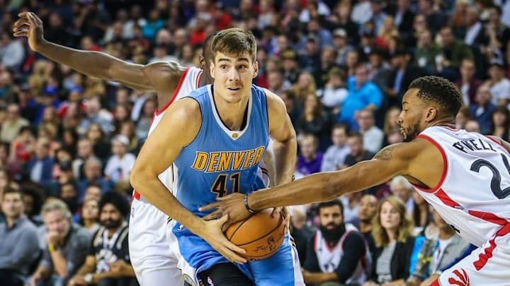 Oct 3, 2016; Calgary, Alberta, CAN; Denver Nuggets forward Juancho Hernangomez (41) drives to the basket against the Toronto Raptors during the fourth quarter at Scotiabank Saddledome. Denver won 108-106. Mandatory Credit: Sergei Belski-USA TODAY Sports