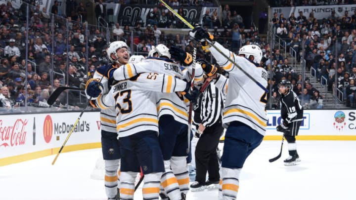 LOS ANGELES, CA - OCTOBER 20: Jack Eichel #9, Jeff Skinner #53, Marco Scandella #6 and Zach Bogosian #4 of the Buffalo Sabres celebrate Skinner's second-period goal during the game against the Los Angeles Kings at STAPLES Center on October 20, 2018 in Los Angeles, California. (Photo by Adam Pantozzi/NHLI via Getty Images)