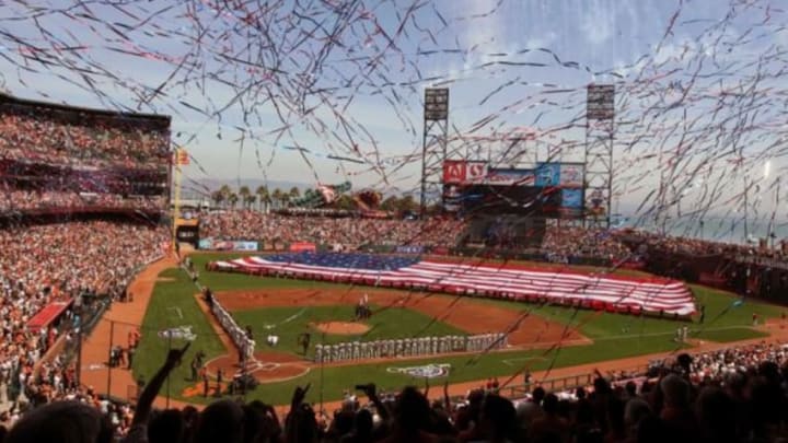 Apr 8, 2014; San Francisco, CA, USA; Baseball fans celebrate San Francisco Giants opening day at AT&T Park prior to their MLB game with the Arizona Diamondbacks. Mandatory Credit: Lance Iversen-USA TODAY Sports