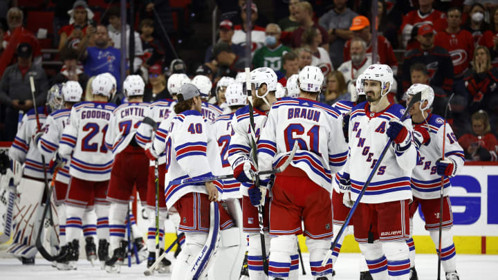 New York Rangers celebrate their 6-2 victory over the Carolina Hurricanes in Game Seven of the Second Round (Photo by Jared C. Tilton/Getty Images)