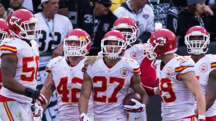 Dec 6, 2015; Oakland, CA, USA; Kansas City Chiefs defensive back Tyvon Branch (27) celebrates with teammates after a touchdown after an interception during the fourth quarter at O.co Coliseum. The Kansas City Chiefs defeated the Oakland Raiders 34-20. Mandatory Credit: Kelley L Cox-USA TODAY Sports