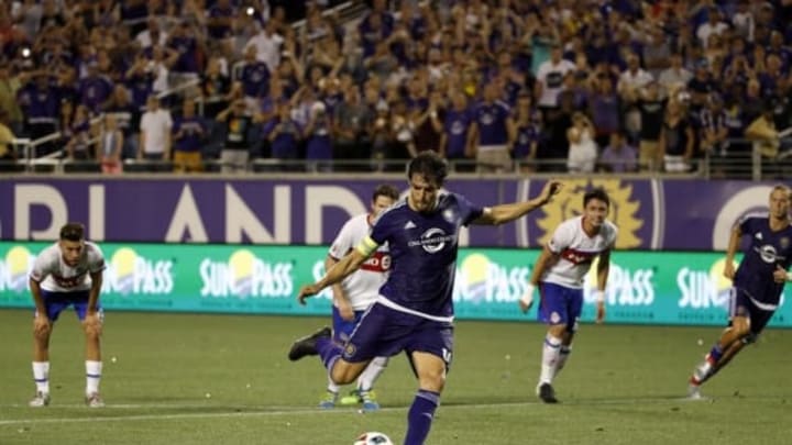 Jun 25, 2016; Orlando, FL, USA; Orlando City SC midfielder Kaka (10) kicks and scores on a penalty kick during the second half against the Toronto FC at Camping World Stadium. Orlando City SC defeated the Toronto FC 3-2. Mandatory Credit: Kim Klement-USA TODAY Sports