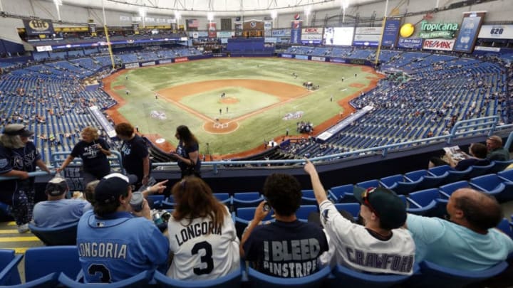 ST. PETERSBURG, FL - APRIL 6: General view of baseball fans getting settled into their seats inside Tropicana Field before the start of an Opening Day game between the Tampa Bay Rays and the Baltimore Orioles on April 6, 2015 in St. Petersburg, Florida. (Photo by Brian Blanco/Getty Images)