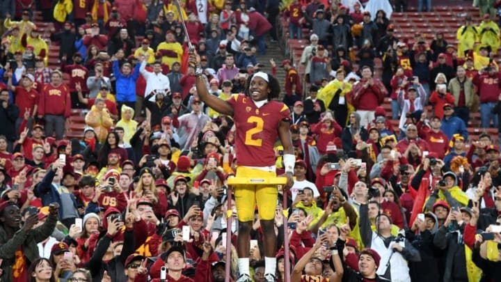 Nov 26, 2016; Los Angeles, CA, USA; Southern California Trojans defensive back Adoree Jackson (2) conducts whte Spirit of Troy marching band after a NCAA football game against the Notre Dame Fighting Irish at Los Angeles Memorial Coliseum. USC defeated Notre Dame 45-27. Mandatory Credit: Kirby Lee-USA TODAY Sports