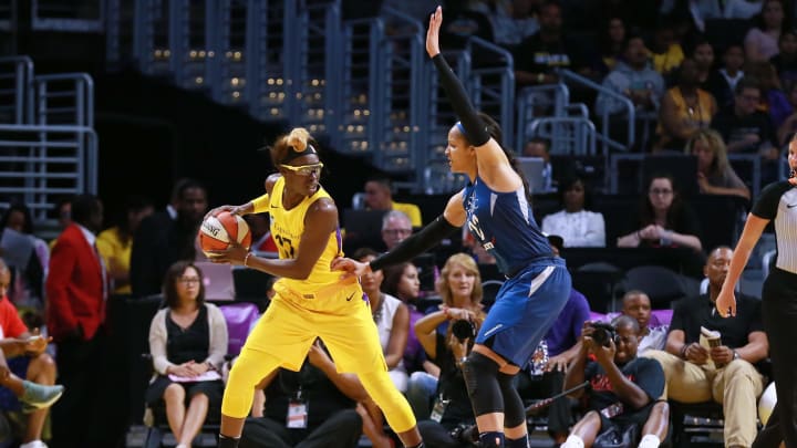 LOS ANGELES, CA – JUNE 03: Essence Carson #17 of the Los Angeles Sparks handles the ball against Maya Moore #23 of the Minnesota Lynx during a WNBA basketball game at Staples Center on June 3, 2018 in Los Angeles, California. (Photo by Leon Bennett/Getty Images)
