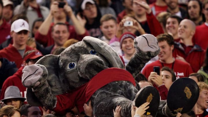 TUSCALOOSA, AL - NOVEMBER 29: Mascot Big Al of the Alabama Crimson Tide crowd surfs from the field to the upper deck while taking on the Auburn Tigers at Bryant-Denny Stadium on November 29, 2008 in Tuscaloosa, Alabama. Alabama defeated Auburn 36-0. (Photo by Doug Benc/Getty Images)