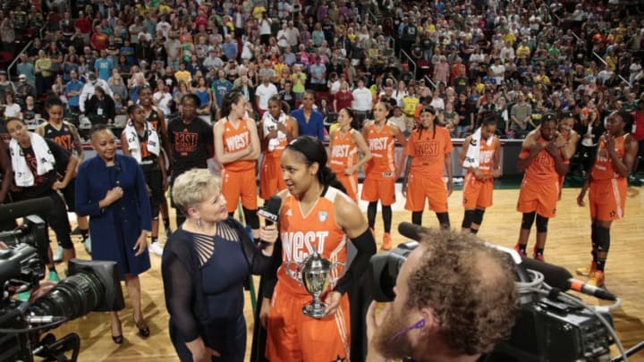 SEATTLE, WA - JULY 22: Maya Moore of the Western Conference All-Stars holds her MVP trophy while being interviewed by ESPN's Holly Rowe after the Verizon WNBA All-Star Game 2017 at KeyArena on July 22, 2017 in Seattle, Washington.  NOTE TO USER: User expressly acknowledges and agrees that, by downloading and or using this photograph, User is consenting to the terms and conditions of the Getty Images License Agreement. (Photo by Joshua Huston/Getty Images)