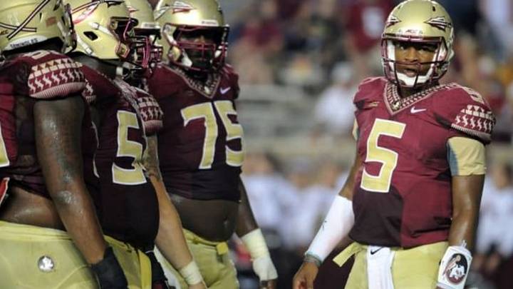 Sep 6, 2014; Tallahassee, FL, USA; Florida State Seminoles quarterback Jameis Winston (5) calls a play in the huddle during the first half of the game against the Citadel Bulldogs at Doak Campbell Stadium. Mandatory Credit: Melina Vastola-USA TODAY Sports