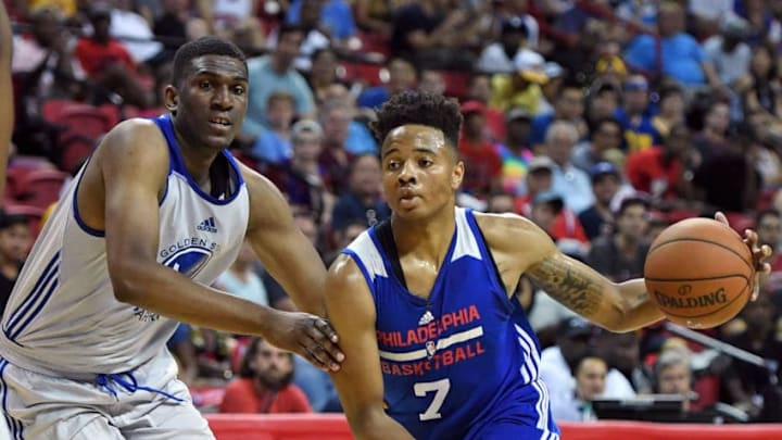 LAS VEGAS, NV - JULY 08: Markelle Fultz #7 of the Philadelphia 76ers drives against Kevon Looney #5 of the Golden State Warriors during the 2017 Summer League at the Thomas & Mack Center on July 8, 2017 in Las Vegas, Nevada. NOTE TO USER: User expressly acknowledges and agrees that, by downloading and or using this photograph, User is consenting to the terms and conditions of the Getty Images License Agreement. (Photo by Ethan Miller/Getty Images)
