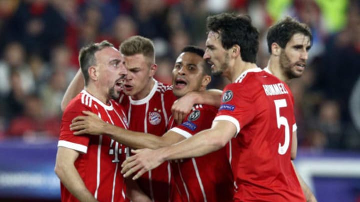 SEVILLE, SPAIN – APRIL 03: Franck Ribery of Bayern Muenchen celebrates with Mats Hummels of Bayern Muenchen after scoring his sides first goal after his shot was deflected in by Jesus Navas of Sevilla (not pictured) during the UEFA Champions League Quarter Final Leg One match between Sevilla FC and Bayern Muenchen at Estadio Ramon Sanchez Pizjuan on April 3, 2018 in Seville, Spain. (Photo by Adam Pretty/Getty Images)