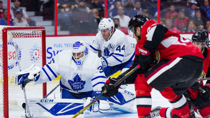 OTTAWA, ON - SEPTEMBER 18: Toronto Maple Leafs goalie Curtis McElhinney (35) scrambles cross the crease tracking a rebound during second period National Hockey League preseason action between the Toronto Maple Leafs and Ottawa Senators on September 18, 2017, at Canadian Tire Centre in Ottawa, ON, Canada. (Photo by Richard A. Whittaker/Icon Sportswire via Getty Images)
