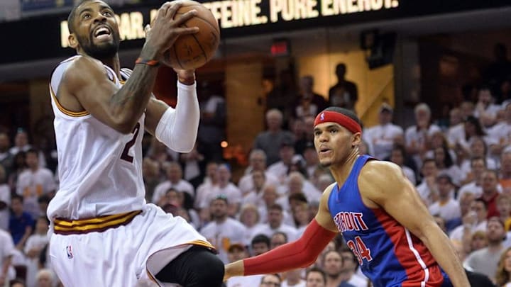 Apr 17, 2016; Cleveland, OH, USA; Cleveland Cavaliers guard Kyrie Irving (2) goes for a shot as Detroit Pistons forward Tobias Harris (34) watches during the fourth quarter in game one of the first round of the NBA Playoffs at Quicken Loans Arena. The Cavs beat the Pistons 106-101. Mandatory Credit: Ken Blaze-USA TODAY Sports