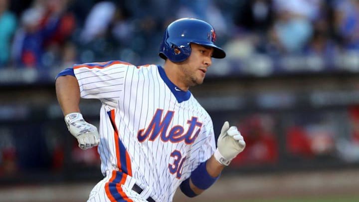 Sep 25, 2016; New York City, NY, USA; New York Mets left fielder Michael Conforto (30) heads out on a two run double to left during the eighth inning against the Philadelphia Phillies at Citi Field. Mandatory Credit: Anthony Gruppuso-USA TODAY Sports