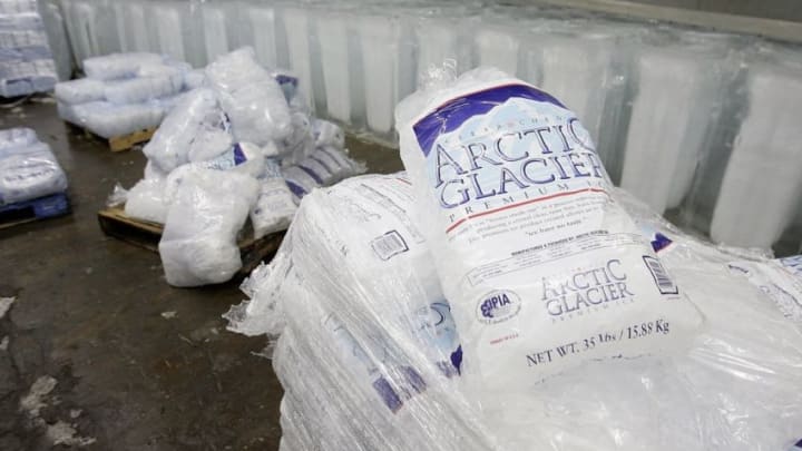 NEW YORK - AUGUST 2: Blocks and bags of ice rest in the freezer at the Losquardo/Arctic Glacier Ice Company August 2, 2006 in the Brooklyn borough of New York City. Company owner Iggy Scalavino said the heat wave has caused a jump in their normal daily production of 400 tons of ice. (Photo by Stephen Chernin/Getty Images)