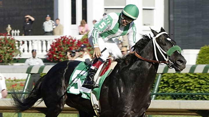 LOUISVILLE, : Jockey Victor Espinoza rides War Emblem to the finish line in winning the 128th running of the Kentucky Derby 04 May 2002 at Churchill Downs in Louisville, KY. War Emblem led from the start and pulled away at the finish to win the 128th Kentucky Derby, becoming the first wire-to-wire winner of America’s greatest horse race since 1988. AFP PHOTO/Robert SULLIVAN (Photo credit should read ROBERT SULLIVAN/AFP/Getty Images)